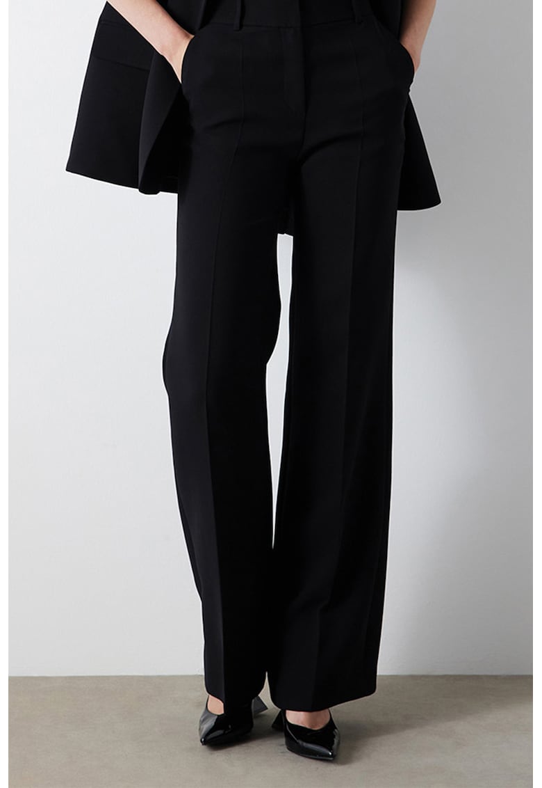 Pantaloni cu talie inalta si croiala ampla