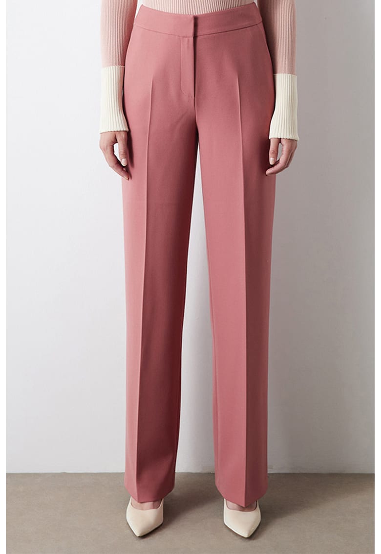 Pantaloni cu croiala ampla si model uni