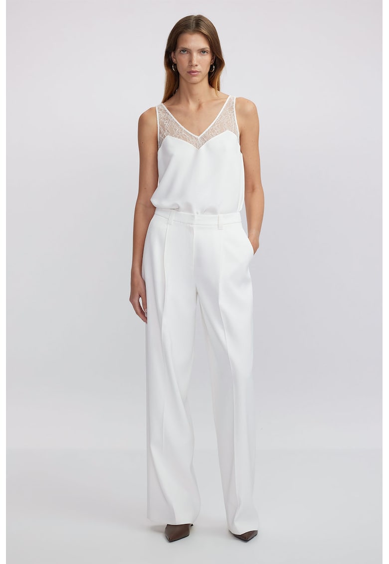 Pantaloni drepti cu buzunare