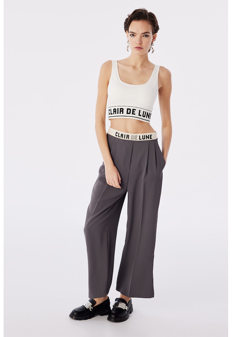 Pantaloni cu croiala ampla si talie inalta