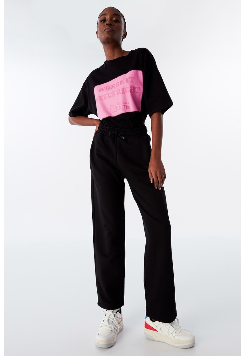 Pantaloni de trening cu croiala conica