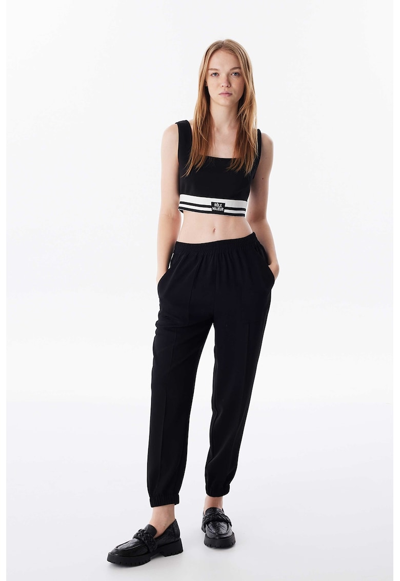 Pantaloni conici cu talie medie