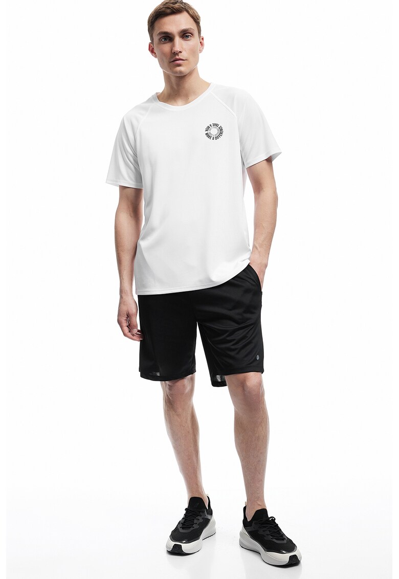 Tricou cu decolteu la baza gatului si maneci raglan