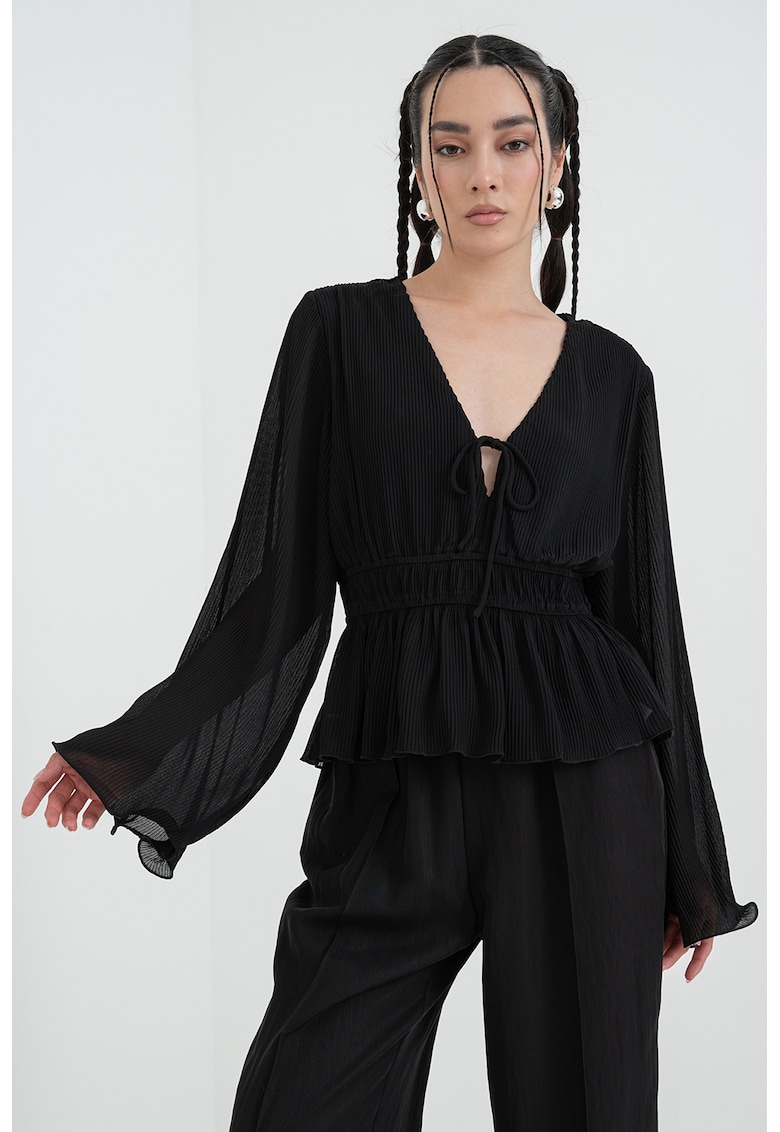 Bluza din peplum cu maneci evazate