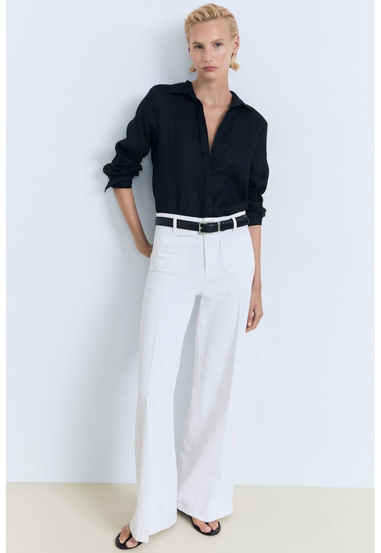 Blugi cu croiala ampla si buzunare aplicate