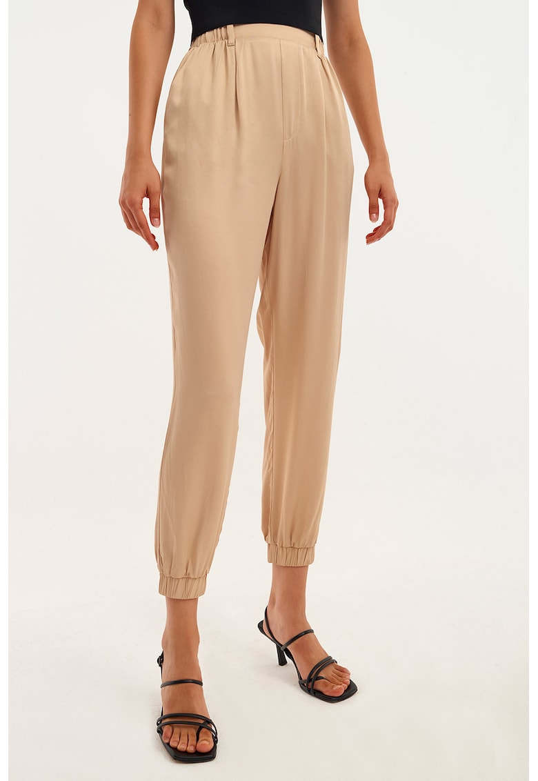 Pantaloni uni conici