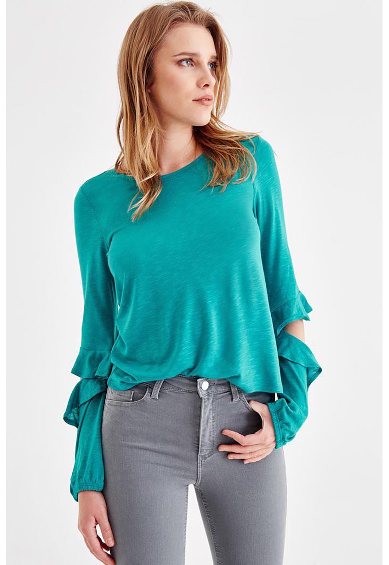 Bluza cu decupaje la nivelul coatelor