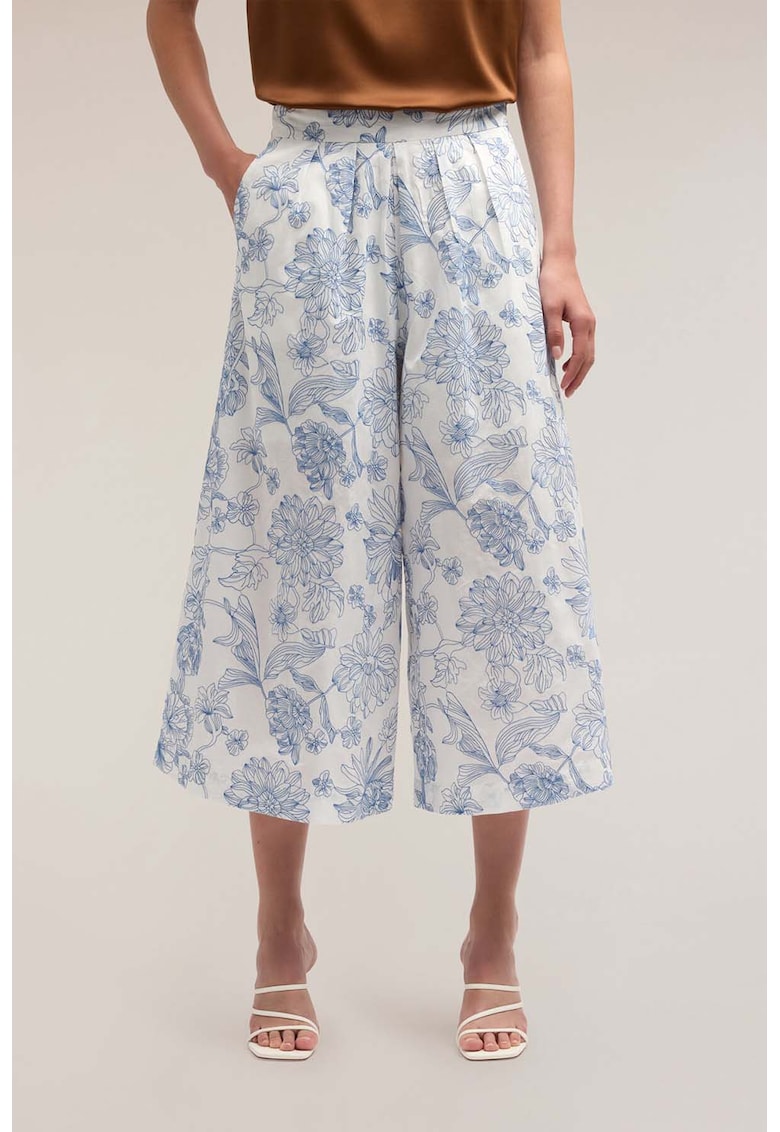 Pantaloni capri evazati cu model floral