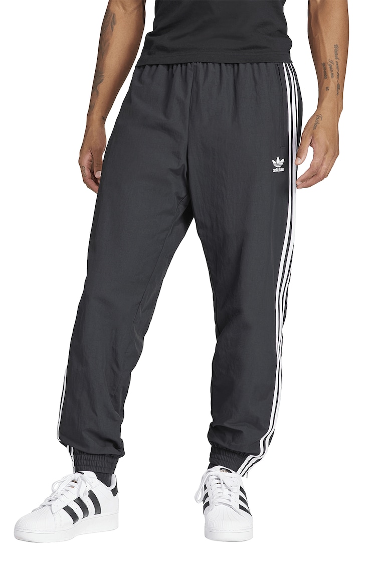 Pantaloni de trening cu terminatii cu fermoar Firebird