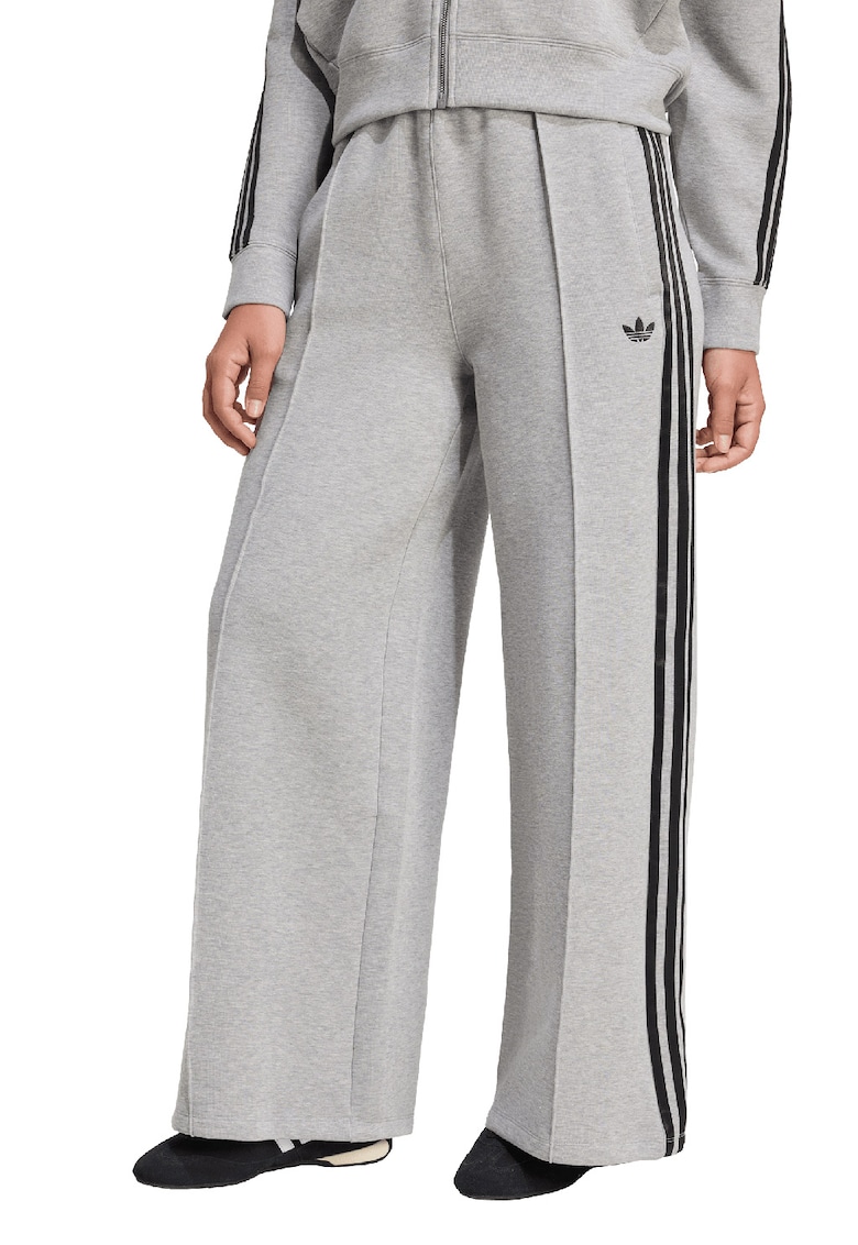 Pantaloni de trening cu croiala ampla si dungi laterale