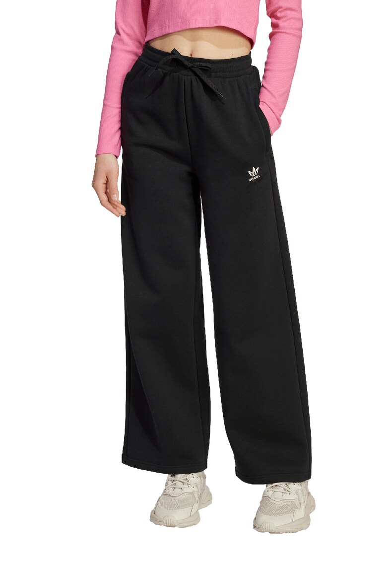 Pantaloni cu croiala ampla si talie inalta