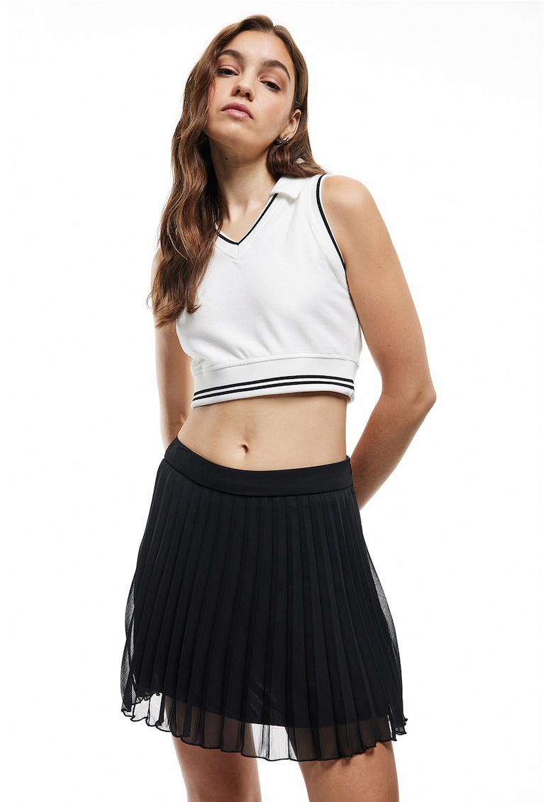 Fusta cu pliuri si talie inalta