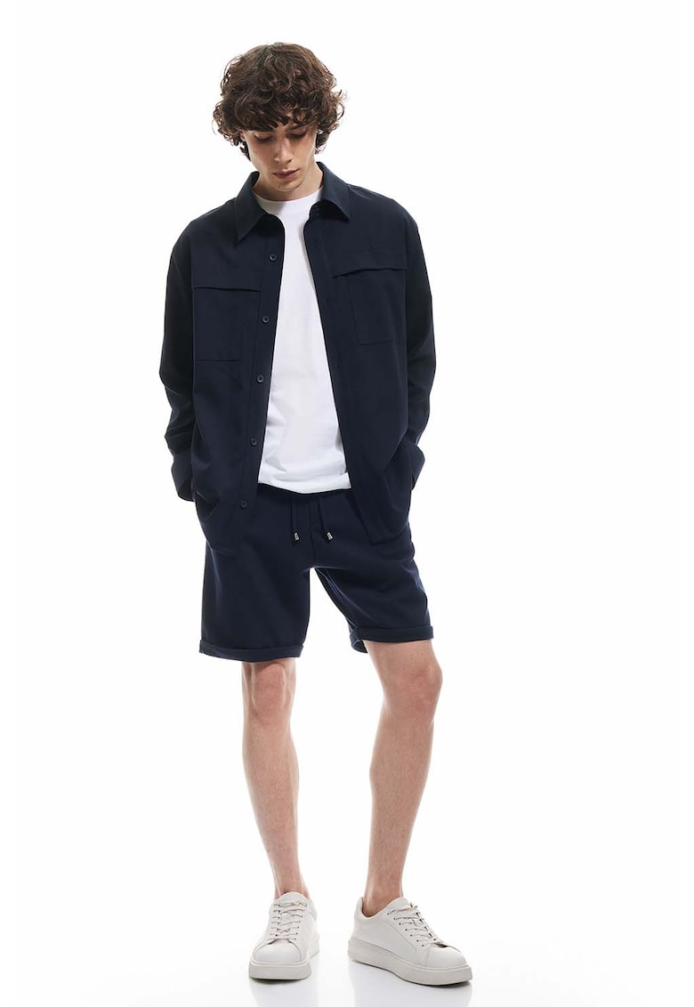 Pantaloni de trening scurti cu buzunare oblice