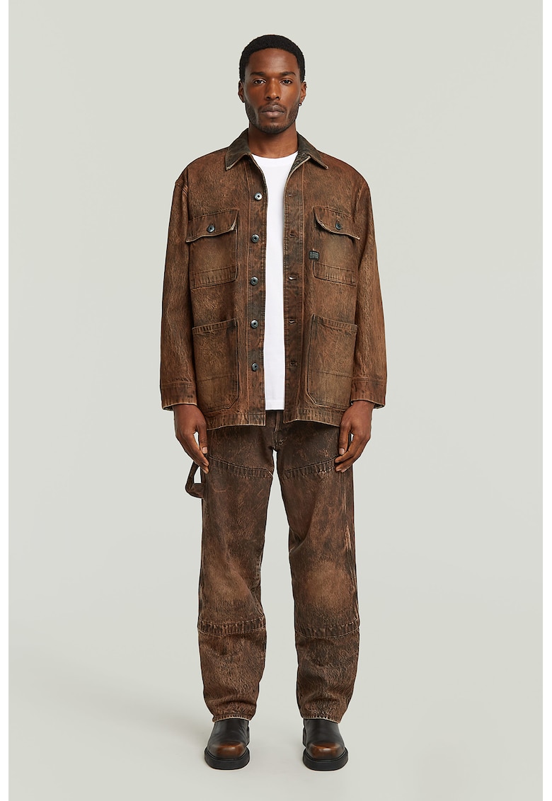 Blugi evazati cu aspect decolorat