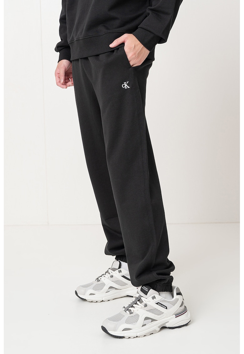 Pantaloni de trening relaxed fit cu terminatie elastica