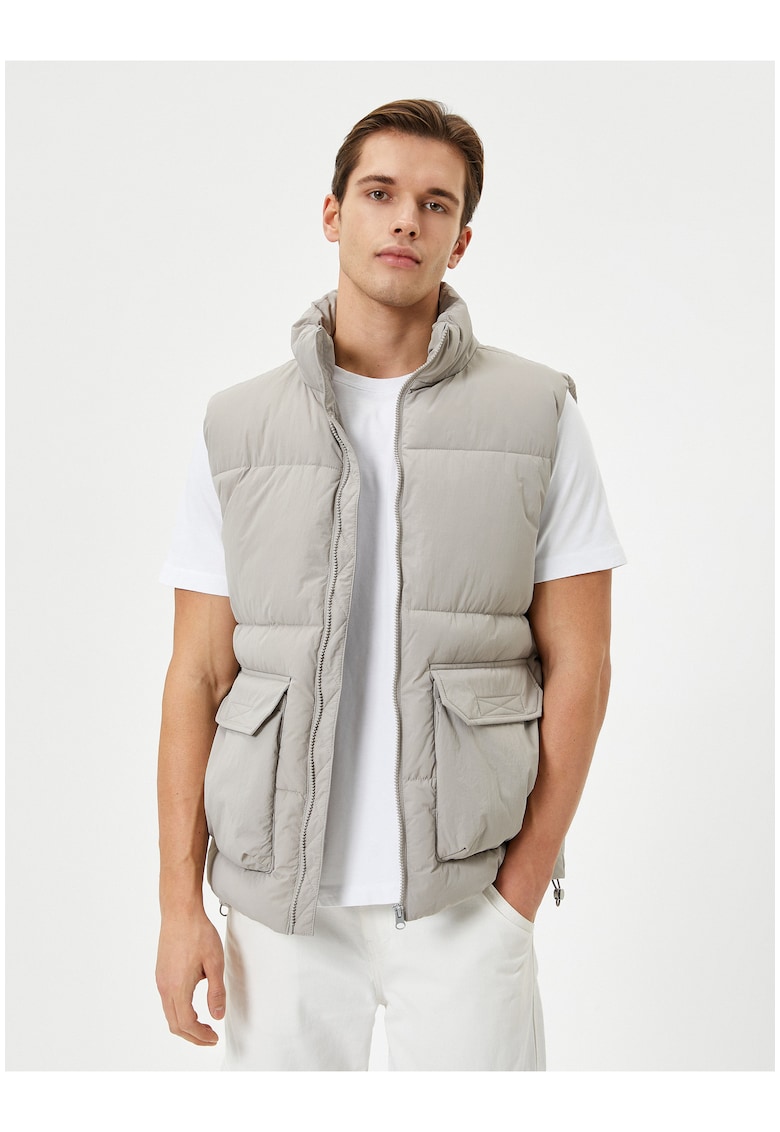 Vesta bufanta cu buzunare laterale