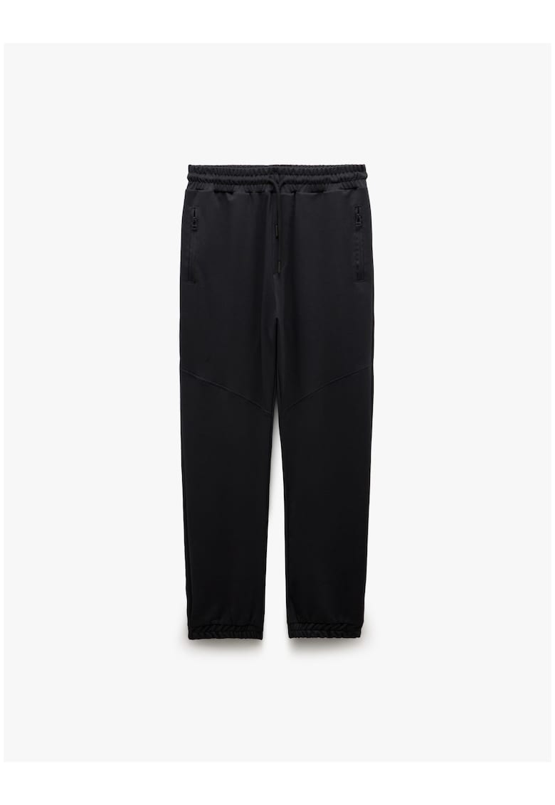 Pantaloni de trening uni cu terminatii elastice