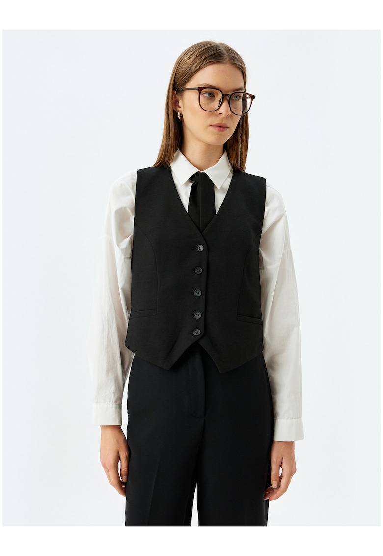 Vesta-sacou cu nasturi