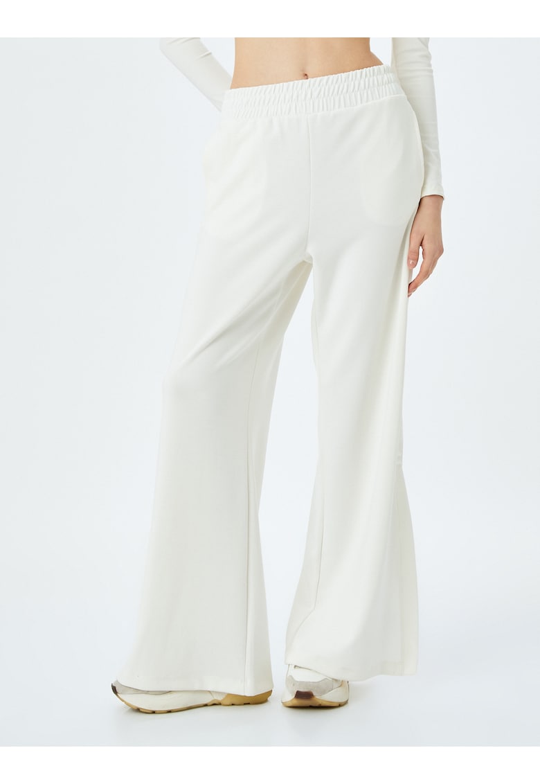 Pantaloni de trening evazati cu slituri laterale