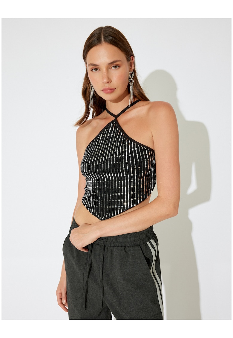 Top crop asimetric cu paiete si siret pe spate