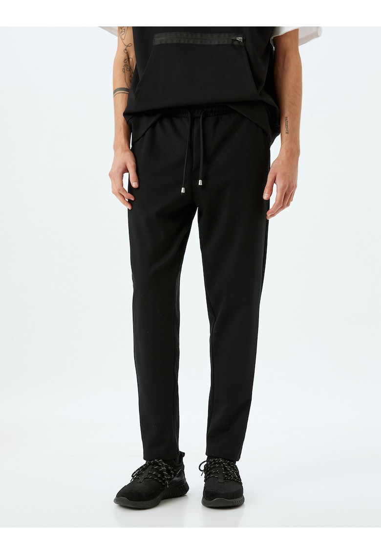 Pantaloni de trening conici cu snur