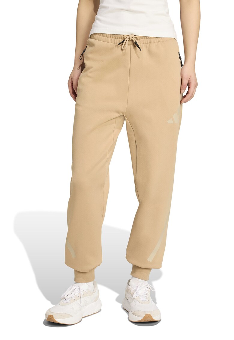 Pantaloni de trening cu buzunare cu fermoar Z.N.E.