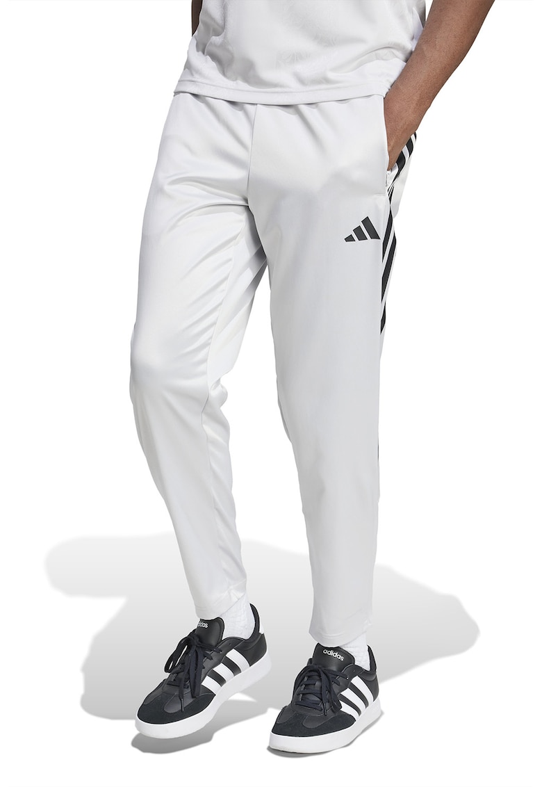 Pantaloni de trening cu logo si buzunare laterale