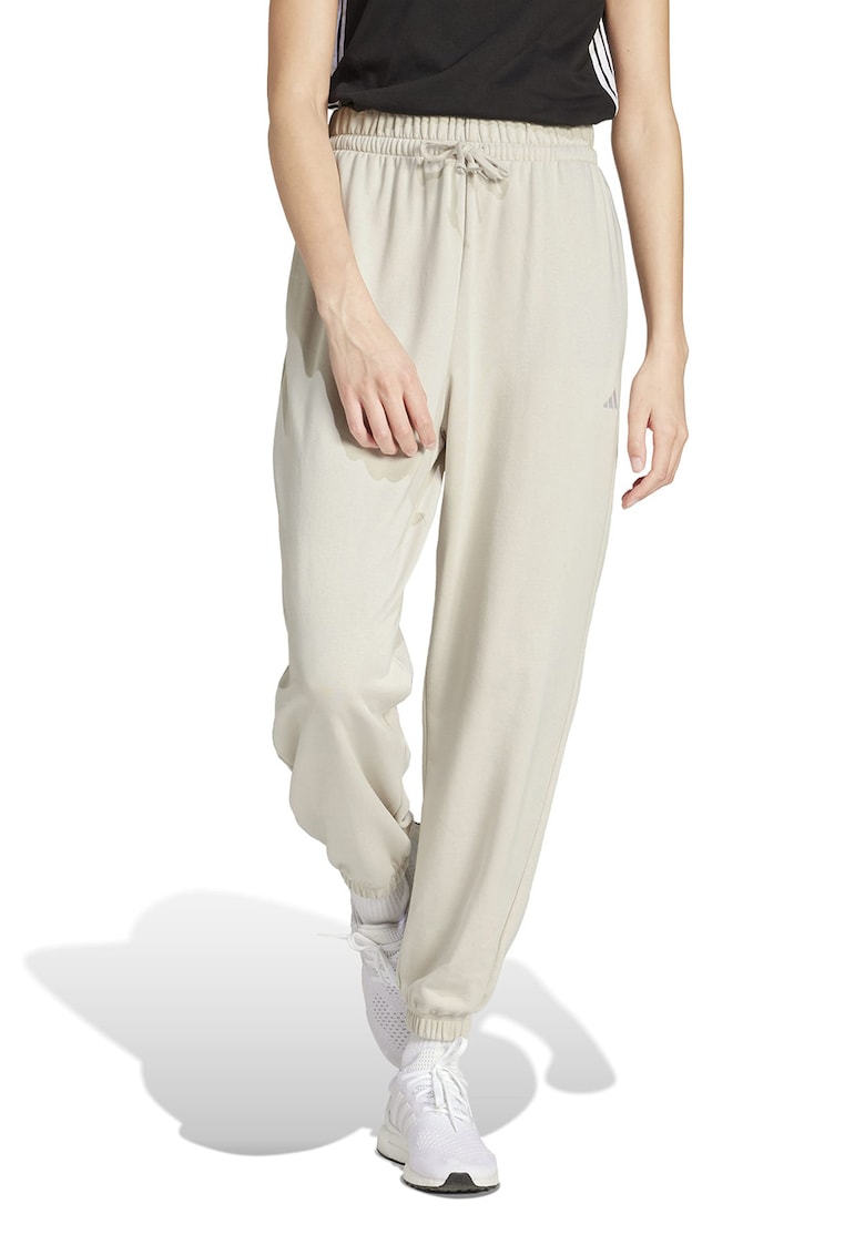 Pantaloni de trening cu snur in talie si croiala conica - Alb fildes