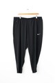 Nike Панталон за бягане с Dri-Fit и размер плюс Жени