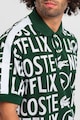 Lacoste Bő fazonú galléros pamutpóló Netflix mintával férfi