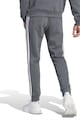 adidas Sportswear Szűkülő szárú szabadidőnadrág oldal zsebekkel férfi
