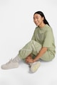 Nike Szűkülő szárú szabadidőnadrág ferde zsebekkel női