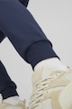 Puma Pantaloni sport conici cu benzi logo Essentials+ Barbati